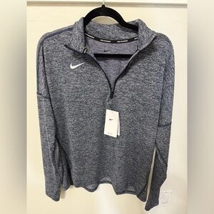 Nike Blue and light greyish blue running top.